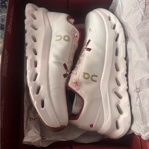 On Running Kids White Sneakers with Gold and Maroon Accents